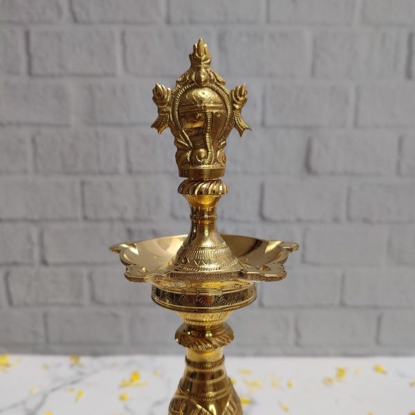 Sangu Chakram – Traditional Brass Kattai Vilakku (Single Lamp) Sangu Chakram – Traditional Brass Kattai Vilakku (Single Lamp)