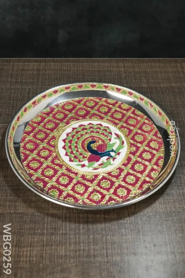 Meenakari round plate with Peacock design Meenakari round plate with Peacock design