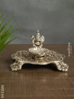 white-metal-ganesh-chowki-with-diya-diyas-206