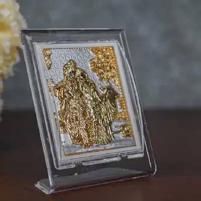 German Silver Plated Radha Krishna Photoframe (4.5 inch) with Stand German Silver Plated Radha Krishna Photoframe (4.5 inch) with Stand