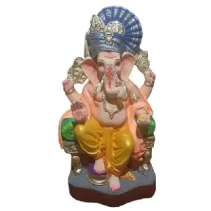 MH Ganapathy Colour Turban – Clay – 18 Inch – Left Trunk Colorful statue of the Hindu god Ganesha seated on a throne, wearing yellow pants and pink robes, with an ornate blue headdress and multiple arms.